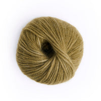 A single ball of olive green yarn photographed from above on a plain white background.