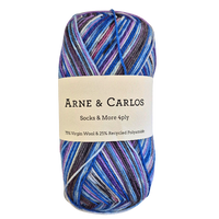 Multicolored yarn ball with Arne & Carlos label on a white background