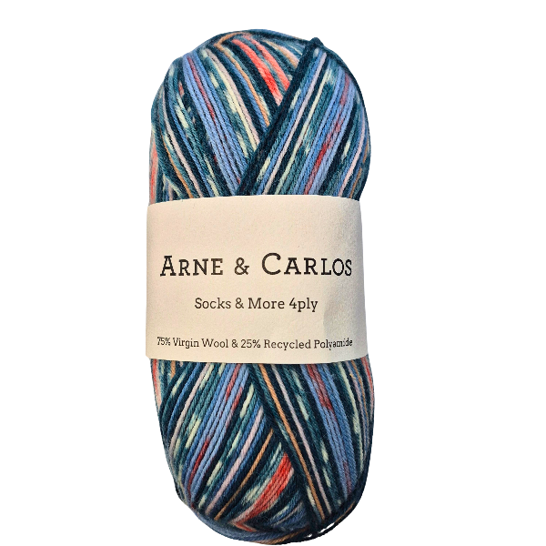 Multicolored skein of yarn with Arne & Carlos label on a white background