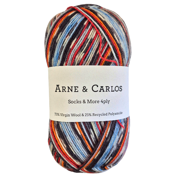 Multicolored skein of yarn with Arne & Carlos label on a white background