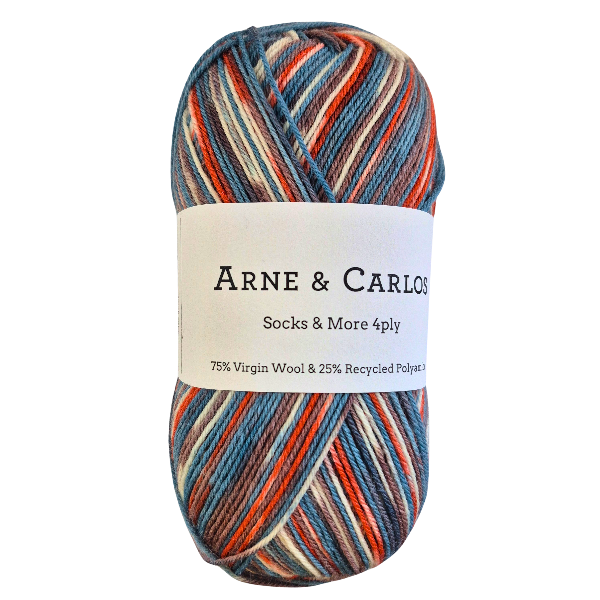 Multicolored skein of yarn with Arne & Carlos label on a white background