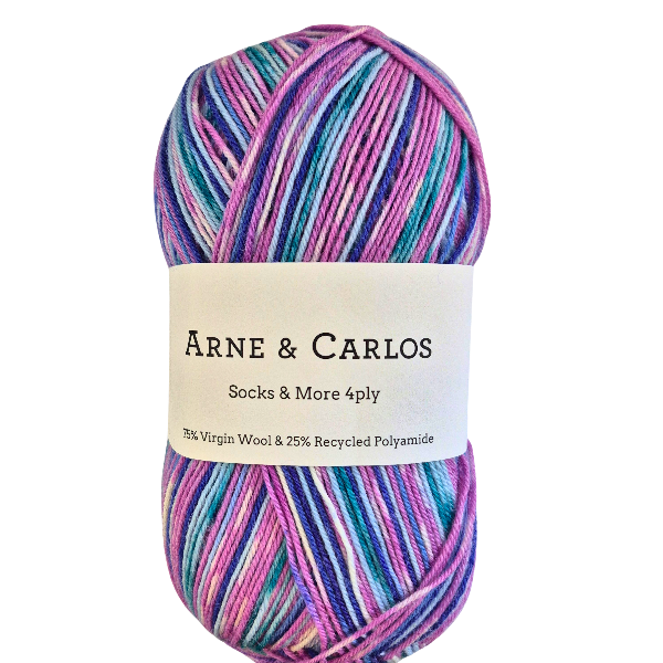 Multicolored skein of yarn with Arne & Carlos label on a white background