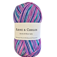 Multicolored skein of yarn with Arne & Carlos label on a white background